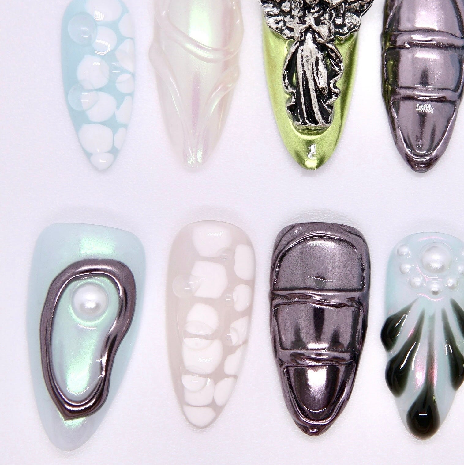 Cool Girl press-on nails featuring surreal sculptural design and organic patterns.