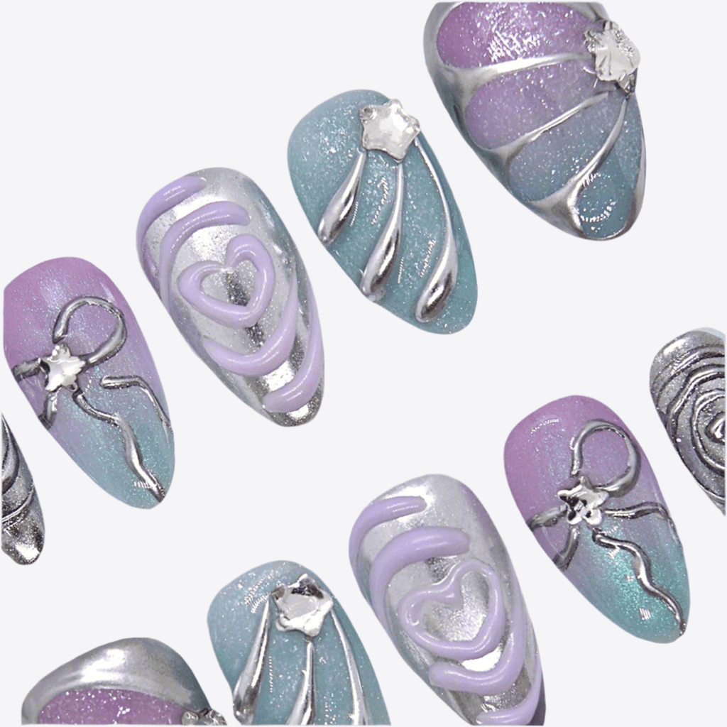 Mini almond-shaped press-ons with a periwinkle to silver ombre effect.