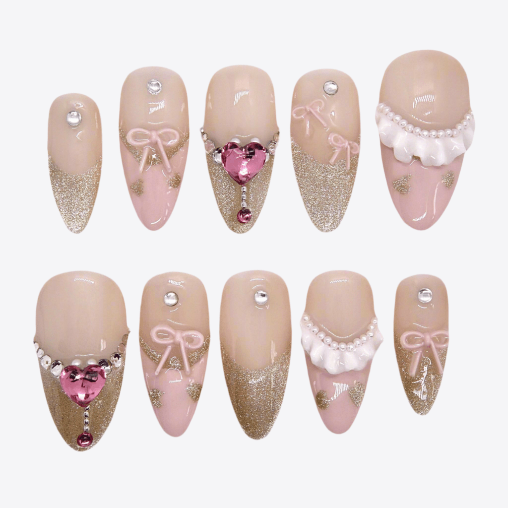 Sugar Dream press-on nails in soft pink with 3D bow and heart charm – Ribbon Agenda full set overview