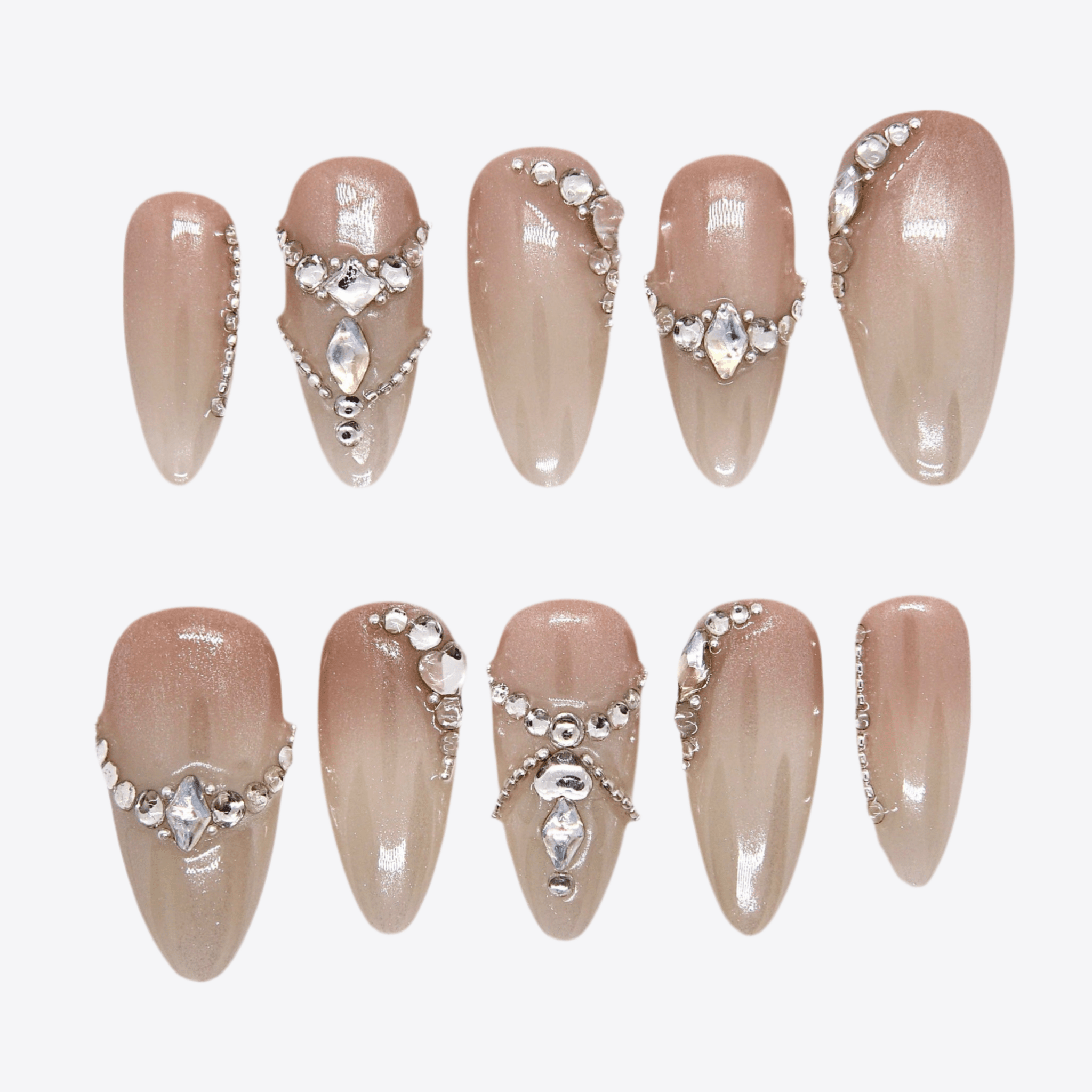 Nude almond-shaped press-on nails with silver rhinestones and glossy shimmer – Soft Power Play